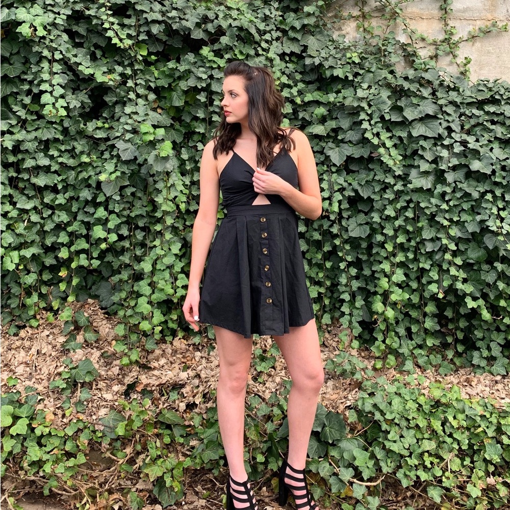 Black dress with middle cut out, back tie and buttons
